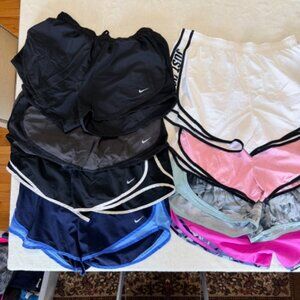 8 pairs of Nike Dri-fit running shorts